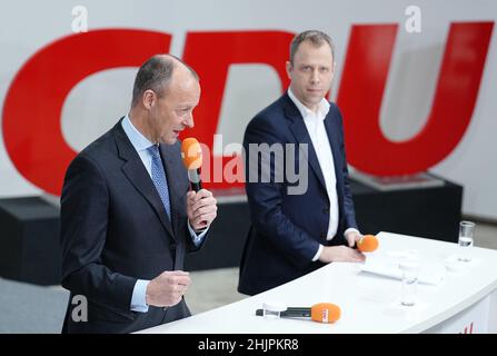 Berlin, Germany. 31st Jan, 2022. Friedrich Merz (l), new CDU party chairman, and Mario Czaja, CDU secretary general, give a press conference after the announcement of the postal election results for the CDU party leadership. Friedrich Merz is now also officially the new CDU chairman. The 66-year-old economic politician received 95.33 percent of the vote in the postal ballot, according to CDU data on Monday. This written vote was necessary for legal reasons after the online party conference on January 22. Credit: Kay Nietfeld/dpa/Ģ����ý Live News Stock Photo