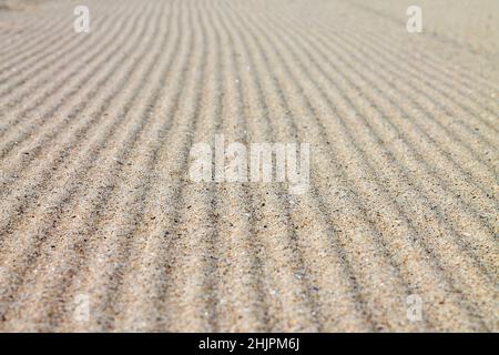 Rippled sand texture for background. Stock Photo
