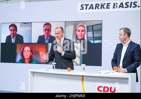 Berlin, Germany. 31st Jan, 2022. Friedrich Merz (l), new CDU party chairman, and Mario Czaja, CDU secretary general, give a press conference after the announcement of the postal election results for the CDU party leadership. Merz is now also officially the new CDU chairman. The 66-year-old economic politician received 95.33 percent of the vote in the postal ballot, according to CDU data on Monday. This written vote was necessary for legal reasons after the online party conference on January 22. Credit: Kay Nietfeld/dpa/Ģ����ý Live News Stock Photo