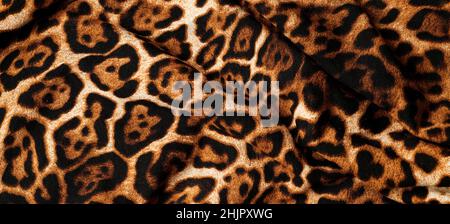a draped panther print fabric to be used as a background Stock Photo