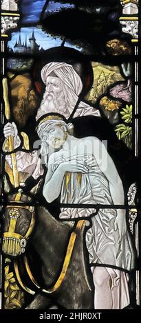 A stained glass window by Percy Bacon & Brothers depicting the Good Samaritan, St Giles Church, Great Coxwell, Oxfordshire Stock Photo