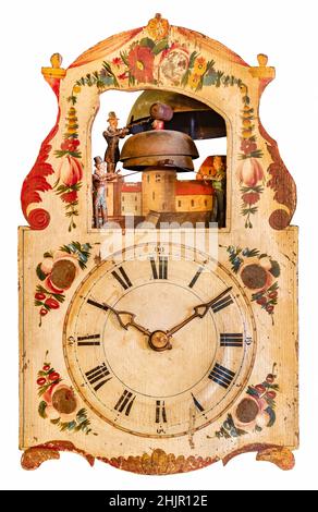 Vintage wooden clock with small carillon and bells isolated on a white background Stock Photo