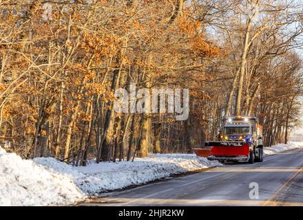 Large plow truck on the North Fork of Long Island, NY Stock Photo