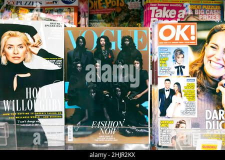 Models on front of Vogue magazine cover Edward Enninful March 2024