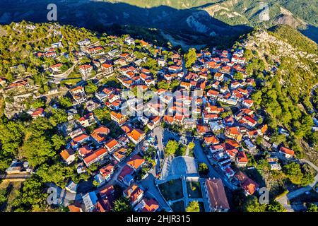 Aerial (drone) view of Spilaio, one of the most beautiful Greek mountainous villages, Orliakas mountain, Grevena, West Macedonia, Greece. Stock Photo