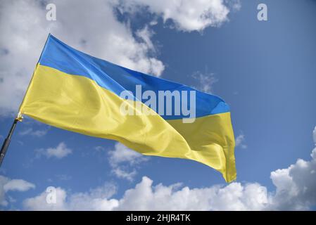 Ukrainian flag waves during a joint military exercise Rapid Trident 2019 at a at the International Center for Peacekeeping and Security of the National Academy of Land Forces near Lviv. Stock Photo