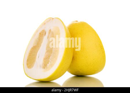 Two halves of sweet pomelo, macro, isolated on white. Stock Photo