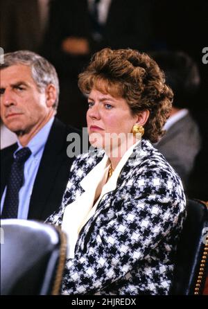 File - Virginia Thomas, wife of Judge Clarence Thomas, sheds a tear as she listens to senators question her husband on the charges leveled against him by Professor Anita Hill, during his confirmation hearing before the United States Senate Judiciary Committee on October 10, 1991 on Capitol Hill in Washington, DC. US Senator John Danforth (Republican of Missouri) is partially obscured at the left of the frame. Photo by Arnie Sachs / CNP /ABACAPRESS.COM Stock Photo