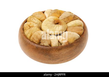 Close up of dried figs. Wooden bowl of dried figs fruits, isolated on white. Stock Photo