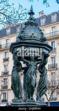 Paris, a beautiful Wallace fountain in the center Stock Photo