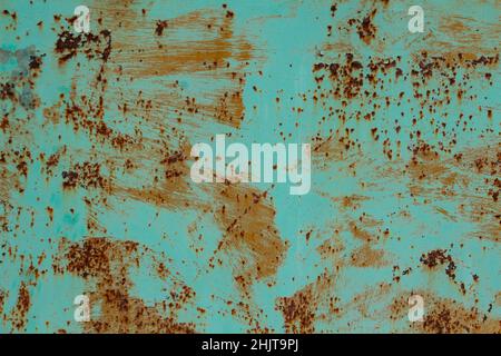 textured metal sheet with peeling blue, turquoise paint, metal corrosion Stock Photo