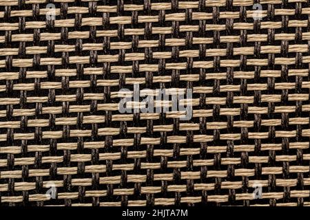 Brown and yellow woven fabric texture closeup. Stock Photo