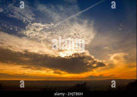 Misty autumn Sunset through the Deister Fields, Lower Saxony,Germany. Stock Photo