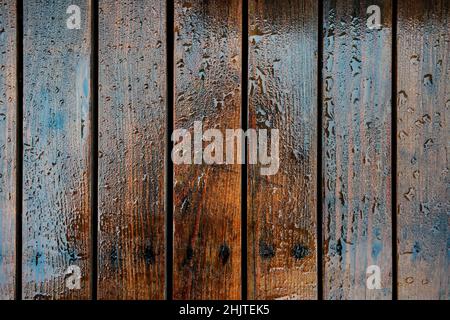 Wooden boards pavement wet from rain, close-up detail from above Stock Photo