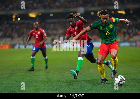 Douala, Cameroon, January, 29, 2022: Ebrima Darboe of Gambia and Pierre Kunde of Cameroon during Cameroon versus The Gambia, Africa Cup of Nations at Japoma stadium. Kim Price/CSM. Stock Photo