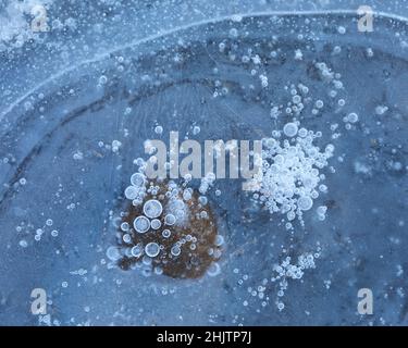Ice detail, bubbles and leaf frozen in Alava in Winter Stock Photo