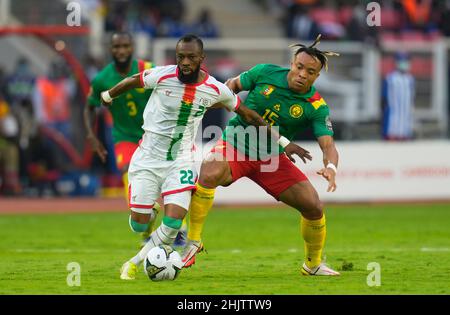 Yaoundé, Cameroon, January, 9, 2022: Blati Touré of Burkina Faso and Pierre Kunde of Cameroon during Cameroon v Burkina Faso - Africa Cup of Nations at Paul Biya Stadium. Kim Price/CSM. Stock Photo