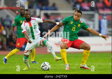 Yaoundé, Cameroon, January, 9, 2022: Blati Touré of Burkina Faso and Pierre Kunde of Cameroon during Cameroon v Burkina Faso - Africa Cup of Nations at Paul Biya Stadium. Kim Price/CSM. Stock Photo