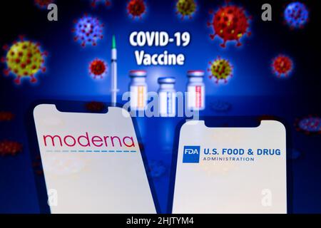 Asuncion, Paraguay. 31st Jan, 2022. Illustration: In-camera multiple exposure image shows logos of Moderna and FDA on smartphone in front of visual representation of virus, medical syringe and vials labeled ''COVID-19 Vaccine''. Moderna, Inc. (Nasdaq: MRNA), a biotechnology company, today announced that the U.S. Food and Drug Administration (FDA) has approved the Biologics License Application (BLA) for Spikevax (COVID-19 Vaccine, mRNA) to prevent COVID-19 in individuals 18 years of age and older. (Credit Image: © Andre M. Chang/ZUMA Press Wire)