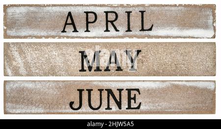 April, May and June months - rough text on grunge wooden blocks isolated on white Stock Photo