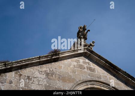 Facade of the Igrexa de Santiago de Redondela with a figure of Santiago Matamoros on horseback along the Camino Portuguese in Redondela, Spain. This l Stock Photo