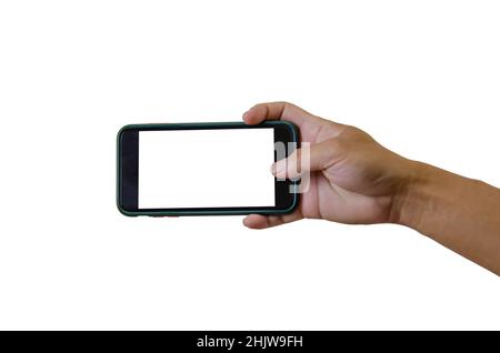Hand holding a smartphone on a white background. White blank phone screen. Stock Photo