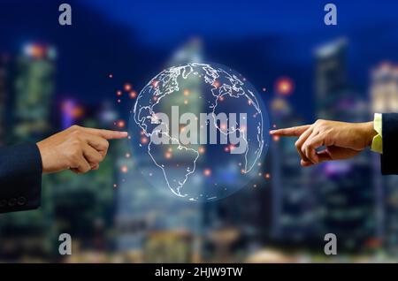 Businessman hand pointing to abstract world glow on blur blue background bokeh, innovation, global business concept. Stock Photo