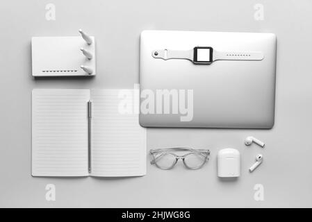 Different gadgets on light background Stock Photo