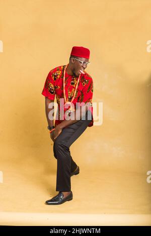 Igbo Traditionally Dressed Business Man Goofing Stock Photo