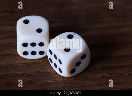 Berlin, Germany. 13th Jan, 2022. ILLUSTRATION - A pair of dice indicates the number two. (recrop) The '2': symbol for opposites, but also for romantic love. For some it is a lucky number, for others just any one of ten digits. It is omnipresent. (To dpa: 'The number two: mathematical, sociable, backwards') Credit: Annette Riedl/dpa/Alamy Live News Stock Photo