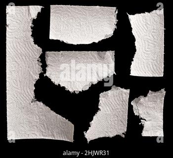 White torn napkin on black background Stock Photo