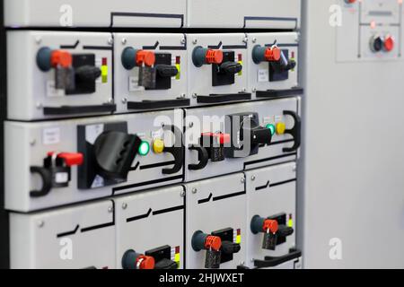 Industrial power distribution cabinet. Electrical distribution board. Circuit breaker panel. Selective focus. Stock Photo