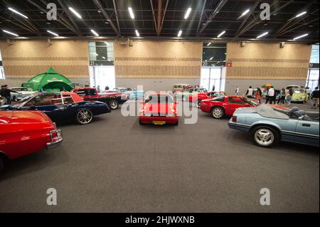 Classic, muscle and performance cars are seen in display during the MCM Show 2022 auto show in Corferias in Bogota, Colombia on January 28 and 29 2022. Stock Photo