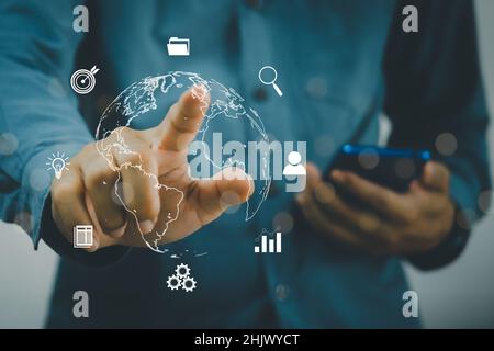 Virtual world technology metaverse concept. World and business icons, modern use of internet, data analysis, communication or online marketing. Stock Photo