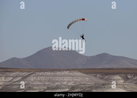ESKISEHIR, TURKEY - SEPTEMBER 12, 2021: Parachutist landing in Sivrihisar SHG Airshow Stock Photo