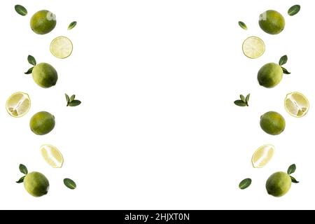 Lime slices with leaves isolated on a white background. Levitation style Stock Photo