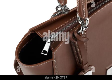 Closeup of brown leather zippered handbag with chrome fittings isolated on white Stock Photo