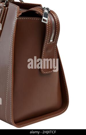 Closeup of handcrafted brown zippered handbag of smooth leather isolated on white Stock Photo