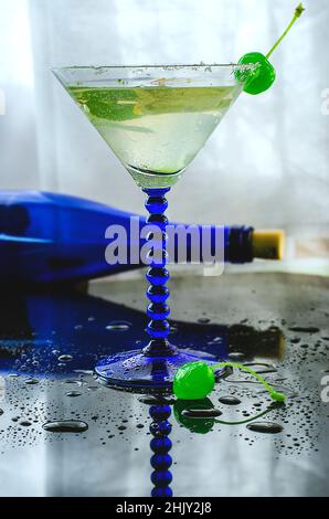 refreshing alcoholic cocktail in a glass with a cherry Stock Photo