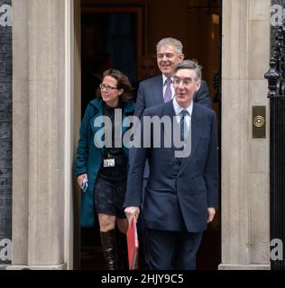 Downing Street, London, UK. 1 February 2022. Jacob Rees-Mogg MP, Lord President of the Council, Leader of the Commons leaves 10 Downing Street after weekly cabinet meeting followed by Brandon Lewis MP, Secretary of State for Northern Ireland, and Natalie Evans, Baroness Evans of Bowes Park, Leader of the House of Lords, Lord Privy Seal. Credit: Malcolm Park/Alamy Live News. Stock Photo