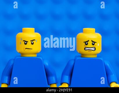 Tambov, Russian Federation - October 17, 2021 Two Lego minifigures - one is  stern with sweat drops and another one is scared against blue background  Stock Photo - Alamy