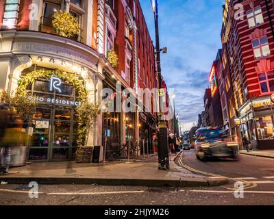 Soho, London. A dusk view of the central London former red light district now better known for its bars, restaurants and night life. Stock Photo