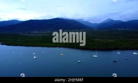 Ocean meets the river with rainforest backdrop in Cairns Stock Photo
