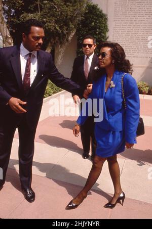 Reverend Jesse Jackson and wife Sammy Davis Jr. Funeral Service on May 18, 1990 at Forest Lawn Memorial Park in Los Angeles, California Credit: Ralph Dominguez/MediaPunch Stock Photo
