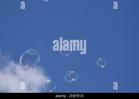 Soap Bubbles against a blue sky Stock Photo