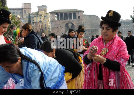 Rome, Italy 14/02/2010: First Edition of the Latin American Carnival in Rome. Via dei Fori Imperiali, Colosseum. © Andrea Sabbadini Stock Photo