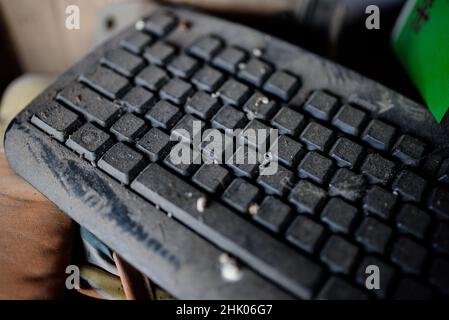 Dust on an old dirty keyboard closeup. Stock Photo