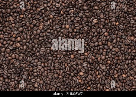 Roasted Coffee beans background . Stock Photo