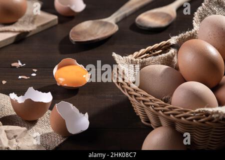 Chicken eggs on wooden background. Farm products. Natural eggs. Stock Photo