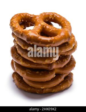 Stacked Large Pretzels Cut Out on White. Stock Photo